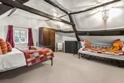 Due to the size of the bedroom, this fabulous cottage can accept a third guest as the daybed turns into a comfy single bed.