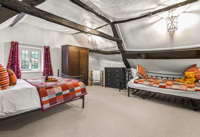 Due to the size of the bedroom, this fabulous cottage can accept a third guest as the daybed turns into a comfy single bed. 