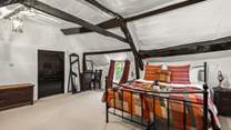 The bedroom offers plenty of space to really spread out and make yourself at home.
