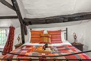 The beautiful beams hold an abundance of charm, ensuring this beautiful cottage retains its history and uniqueness.