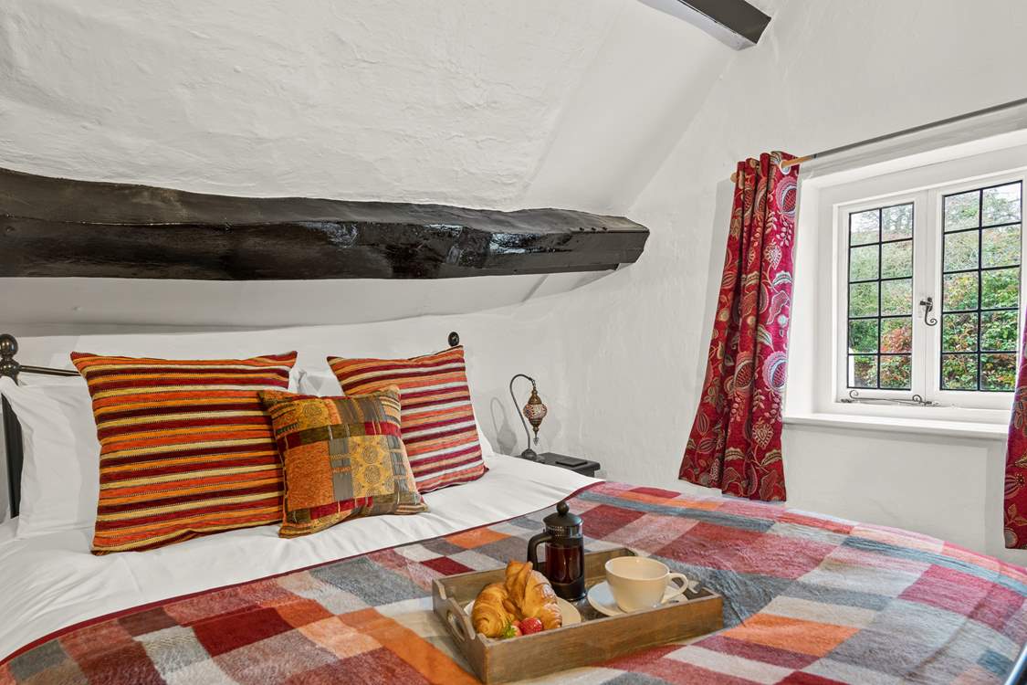 The bedroom is home to this fabulous king-size bed and offers oodles of comfort and space.