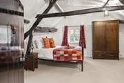 Peeking into the bedroom gives you an idea of the vast floor space at your disposal.