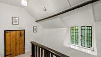 Back in the house, on the first floor, you are greeted by this spacious landing area.