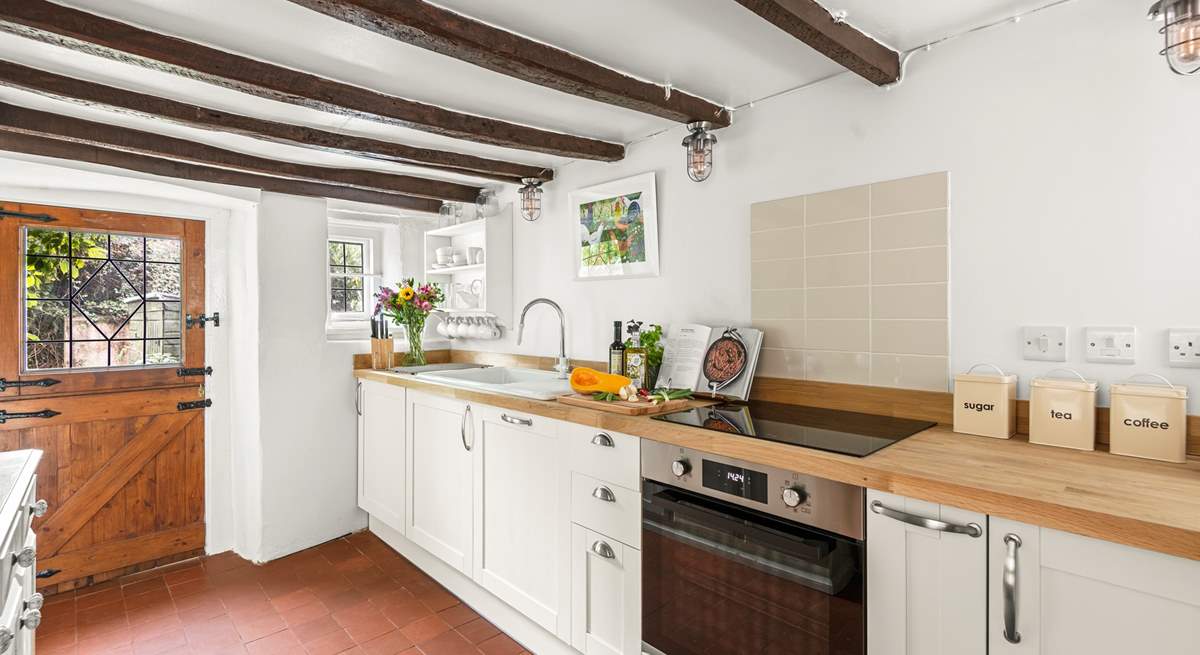 The kitchen leads out into the patio and garden area.