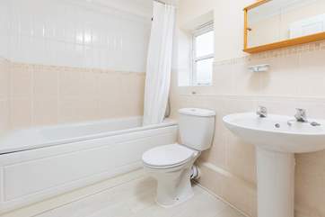 The family bathroom is modern and bright.