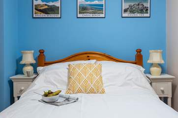 Relax in this colourful bedroom.