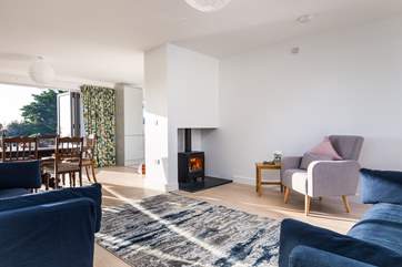Light the wood-burner for a cosy evening in, snuggle up on a three seater sofa or nestle into an arm chair.