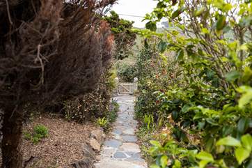 Follow the path to the lane leading to the coastpath and the beach.