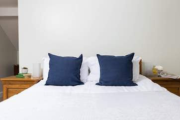 Stretch out and relax in the king-size bed in the master bedroom (Bedroom 2).