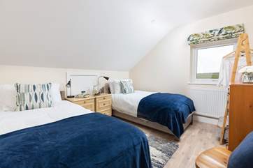 The sweet twin bedroom looks out over the moorland, please watch your step up into this bedroom (Bedroom 4).