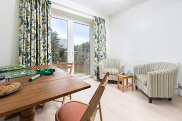 Sit back and relax in your own sitting area in the ground floor bedroom with double doors which opens straight to the garden.