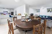 Enjoy a feast around the ornate dining-table.