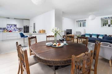 Enjoy a feast around the ornate dining-table.