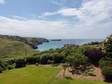 The island off the shore is a RSPB nature reserve for birds.