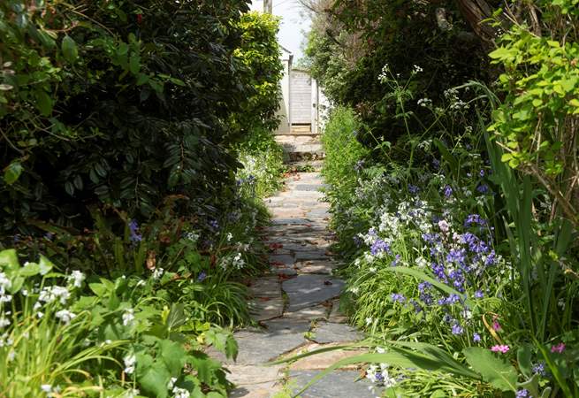 Follow the garden path to the beach lane.
