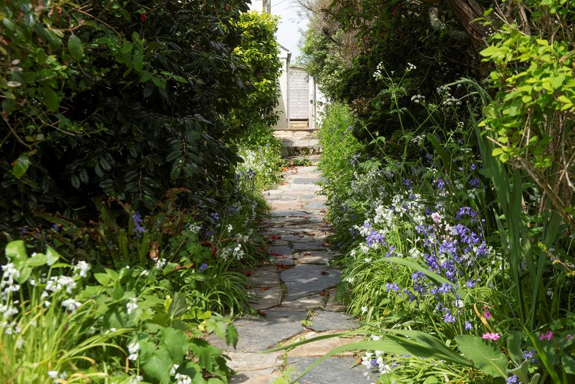 Follow the garden path to the beach lane.