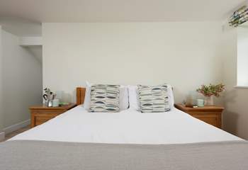 Stretch out and relax in the king-size bed in this bedroom. 