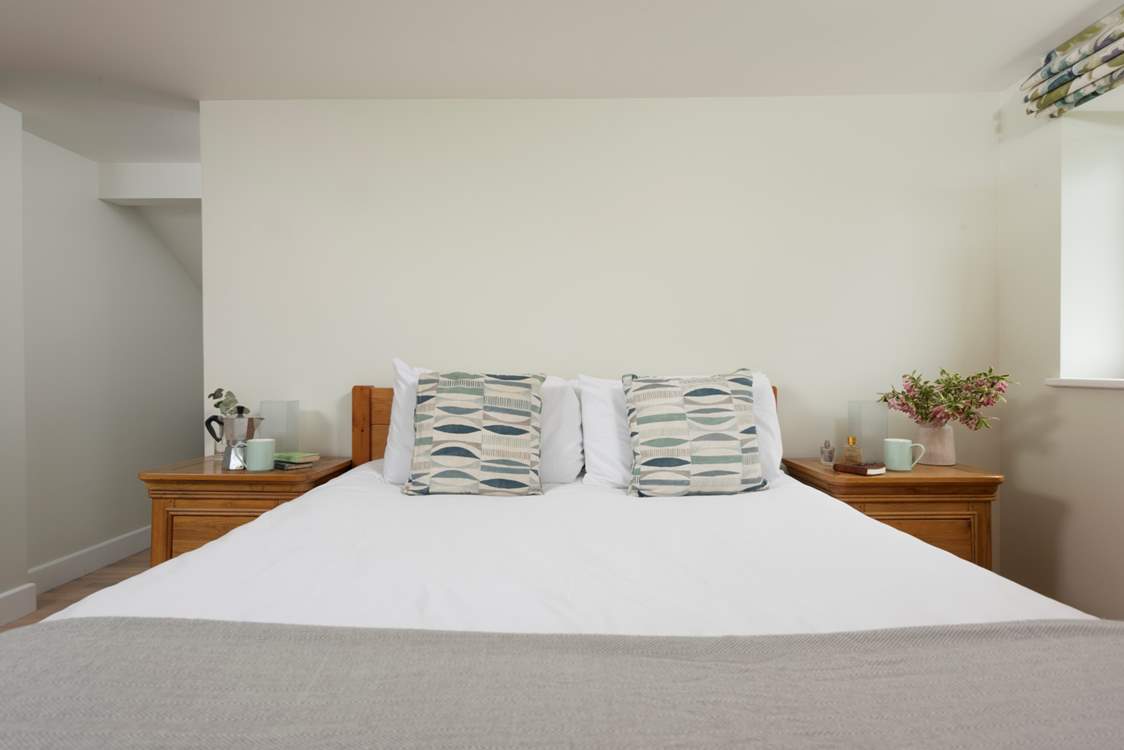 Stretch out and relax in the king-size bed in this bedroom.