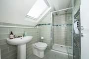The en suite for the main bedroom.