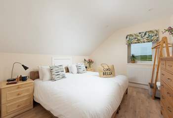 This beautiful bedroom is also on the first floor, and overlooks the moorland.