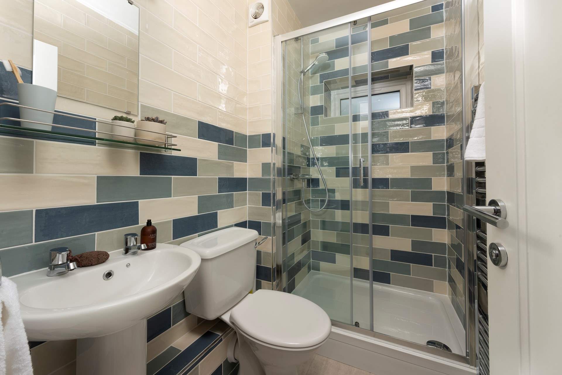 The modern en-suite shower-room for the ground floor bedroom. 