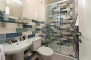 The modern en-suite shower-room for the ground floor bedroom.