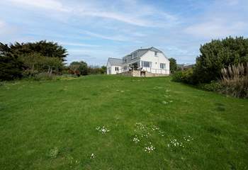 The garden overlooks the ocean, and has direct access to the beach pathway.