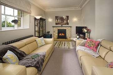 Snuggle into the sofas whilst enjoying the warmth of the electric fire.