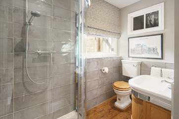 Shower-room with views overlooking the courtyard.