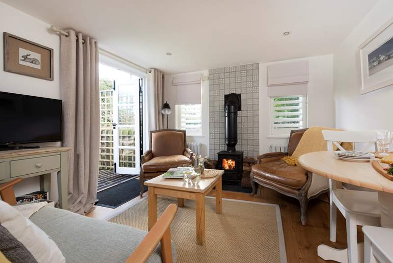 The open plan living-room with cosy wood-burner.