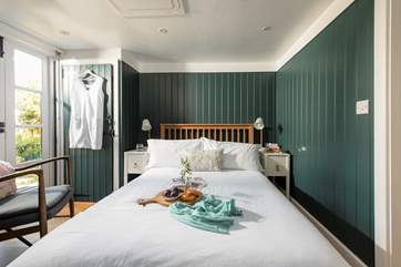 The relaxing bedroom with en suite shower-room.