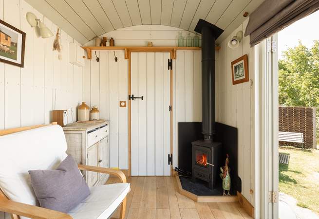 The toasty wood-burner adds warmth throughout.