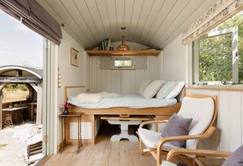 The space transforms with a pull-down bed for restful nights sleep.