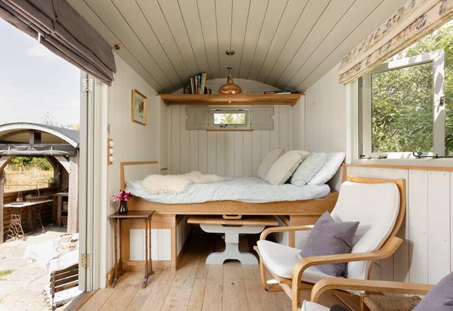 The space transforms with a pull-down bed for restful nights sleep.