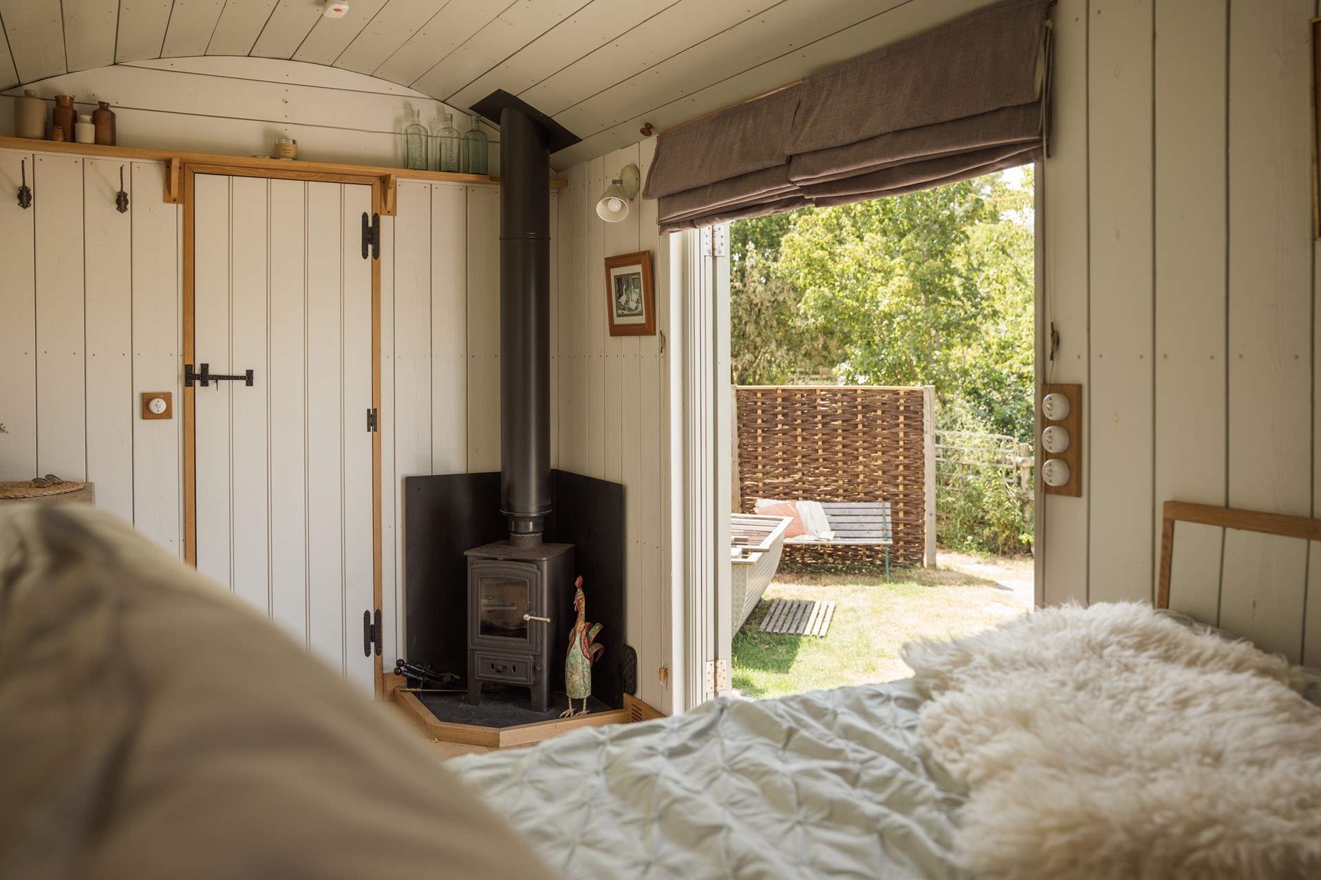 Wake slowly as the light flows through the double doors.