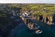The quaint village of Cadgwith is so charming (you can see Pink Cottage on the left with the large picture windows).
