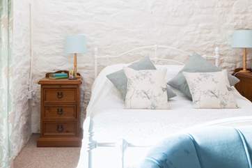 Lovely linens adorn the beds.