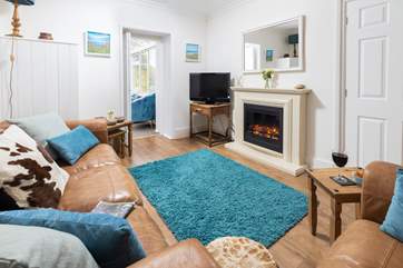 The cosy sitting-room for a relaxing night in after a day of exploring.