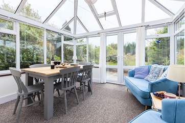 The conservatory overlooks the south facing gardens.