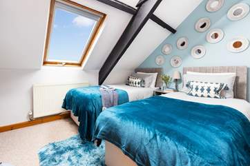 One of the twin bedrooms.