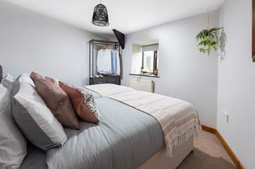 Bedroom One is a cosy room with twin beds.