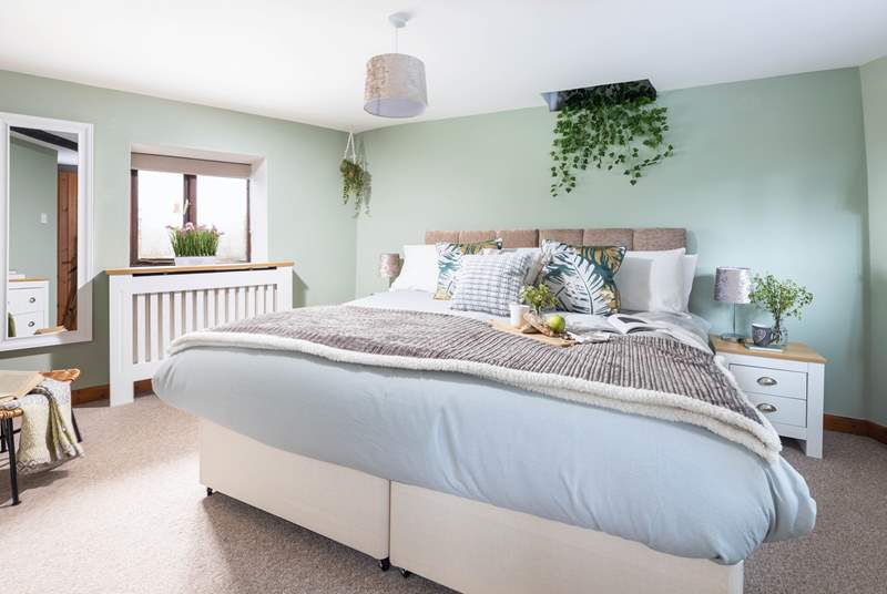 The calming tones of one of the bedrooms - how comfortable does that bed look?!