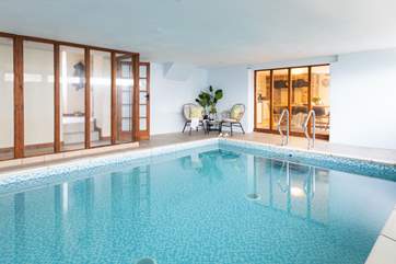The indoor private swimming pool awaits your arrival at Horseshoe Cottage.