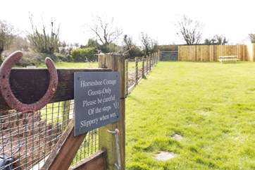 This delightful garden is across the courtyard, up some steps and ideal for kids and dogs to play freely.