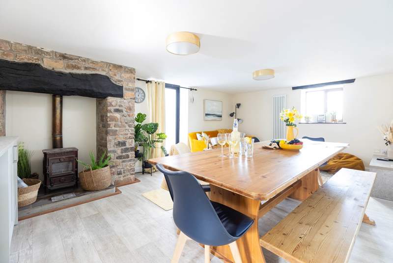 This bright room offer the perfect spot for the family to come together and relax.  Please note the log burner is ornamental.