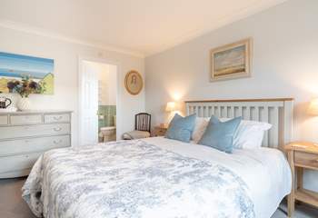 The main bedroom on the first floor is a delight and has the added benefit of an en suite bathroom.