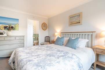 The main bedroom on the first floor is a delight and has the added benefit of an en suite bathroom.