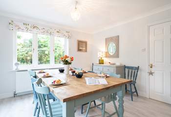 The kitchen/dining-room overlooks the pretty garden. 