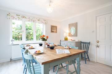 The kitchen/dining-room overlooks the pretty garden.