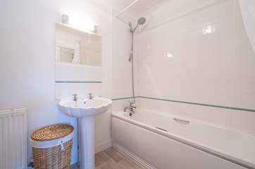 The family bathroom on the first floor, perfect for a relaxing soak.